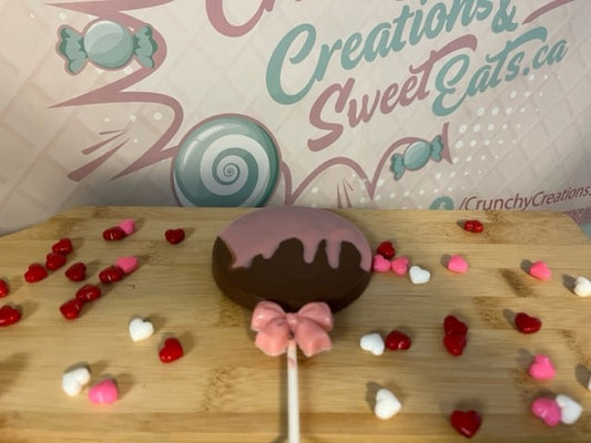 Large lollipop with pink drip & bow